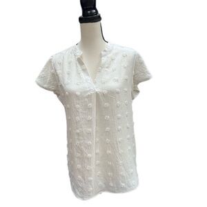 Cute white short sleeve top, new‎ without tags. Size Large